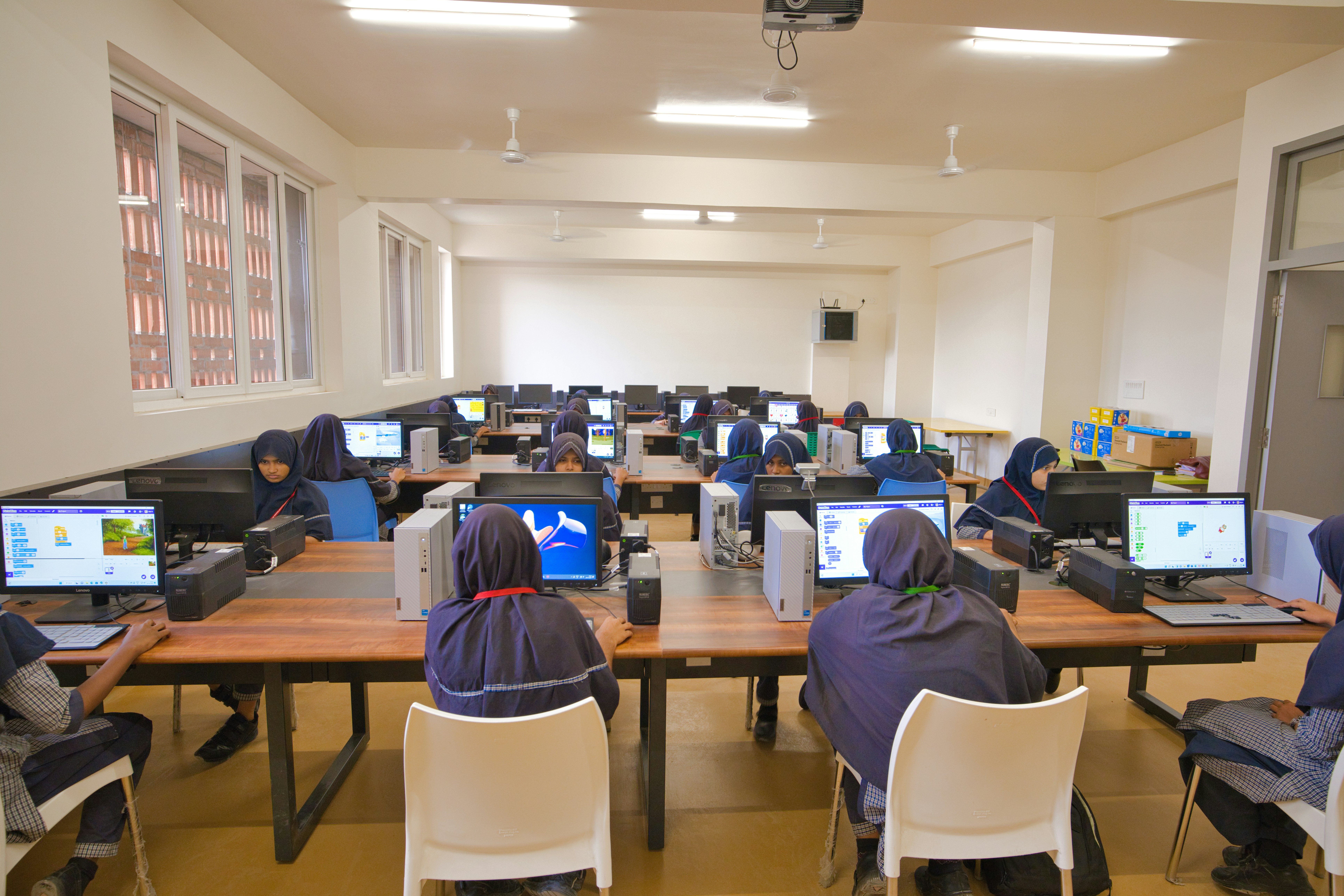 Students practicing in computer lab